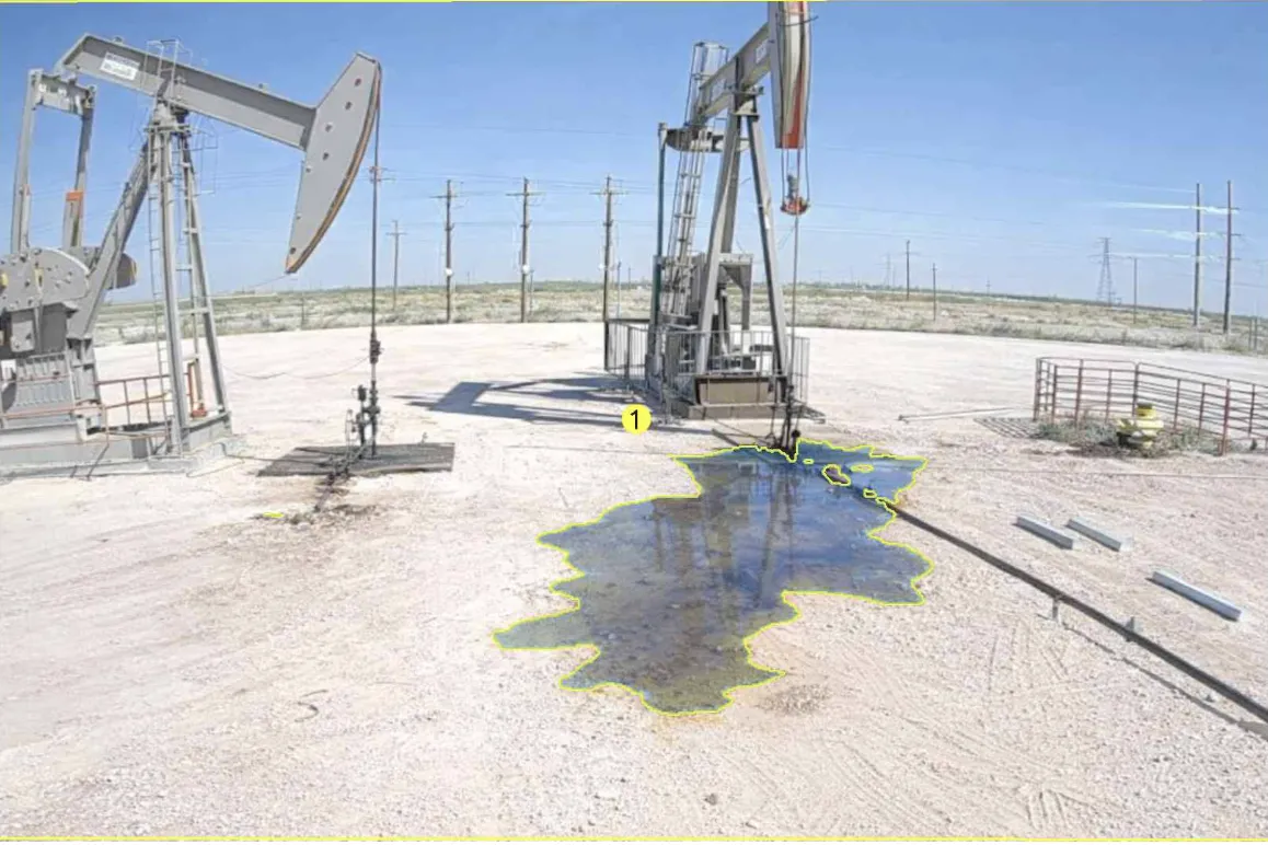 VisionAery AI liquid leak detection outlining a crude oil spill at the base of a Permian Basin pumpjack